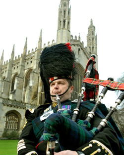 Roy playing the bagpipes at an event