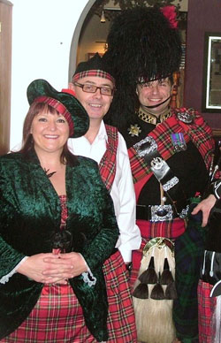 Roy playing the bagpipes at an event