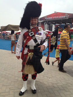 Roy playing the bagpipes at an event