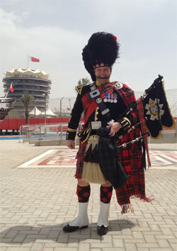 Roy playing the bagpipes at an event