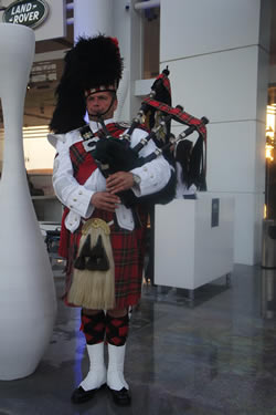 Roy playing the bagpipes at an event