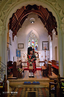 Roy playing the bagpipes at an event