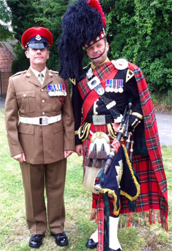 Roy playing the bagpipes at an event