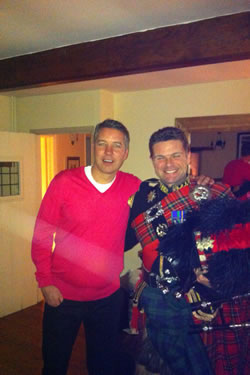 Roy playing the bagpipes at an event